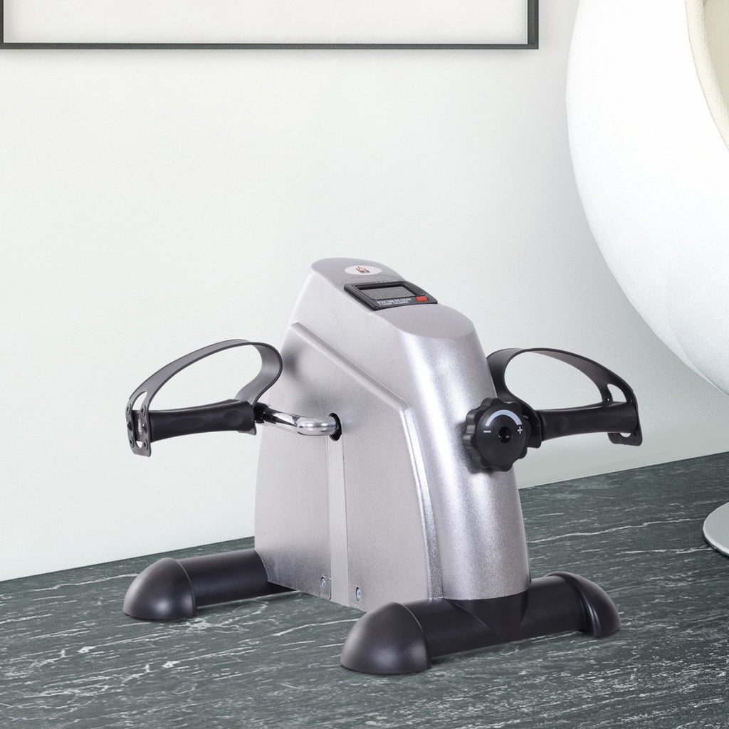 Pedal exerciser under a desk